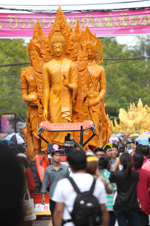 UBONRATCHATHANI, THAILAND - JULY 12  Thai tourists and foreigners are appreciated candle procession in Candle festival  Ubon Candle Festival 2014  on July 12, 2014, UbonRatchathani, Thailandのeditorial素材