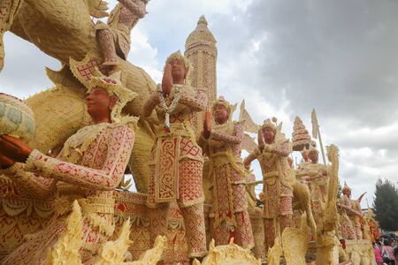 Ubon Ratchathani,THAILAN D - July 12   Line Thai art of Candle Festival ,Thai art Candle wax, on July 12, 2014, Ubon Ratchathani, Thailandのeditorial素材
