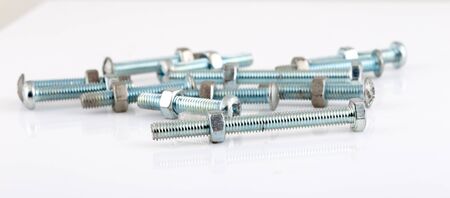 bolts and screw on white background.Focus point.の写真素材