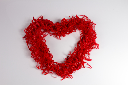 Red paper hearts on white.の写真素材