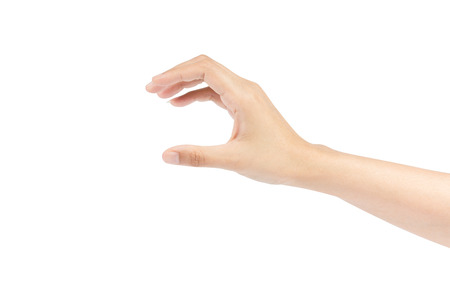 Woman's hand holding isolated on a white background.の写真素材