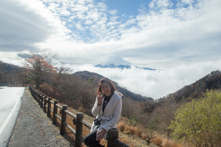 Woman on Mount Fuji on cloudy days - Top view from mount.の写真素材