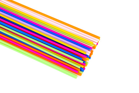 Colorful plastic tubes isolated on a white background.の写真素材