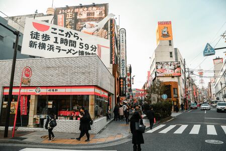 Yokohama, Japan - November 20, 2018 : Tourists are walking, shopping and eating in Chinatown at YOKOHAMA, JAPAN. Cinema tone concept.のeditorial素材