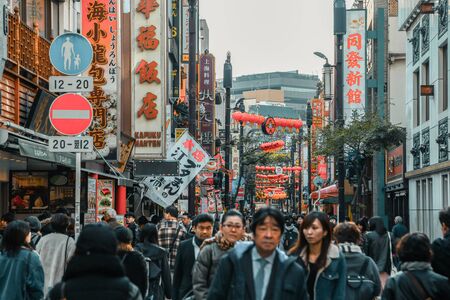 Yokohama, Japan - November 20, 2018 : Tourists are walking, shopping and eating in Chinatown at YOKOHAMA, JAPAN. Cinema tone concept.のeditorial素材