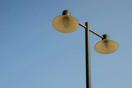 Street lamps on blue sky