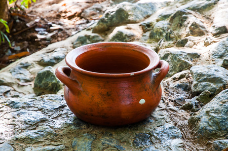 Thai cray pot on the rock.の写真素材