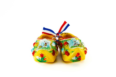 Yellow Dutch shoes isolated on whiteの写真素材