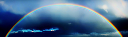 Stormy sky with a rainbow の写真素材