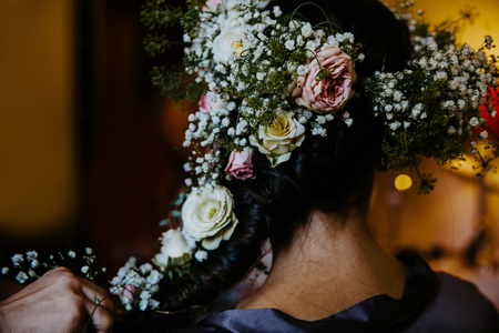 Bride hairstyle with flowers. Getting ready.の写真素材