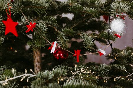 Christmas tree with different ornaments and lights. Close up image.の写真素材