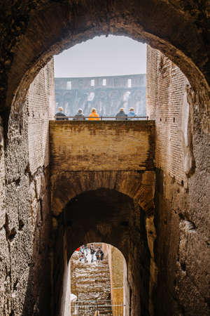 Inside view of the Colosseum. Tourists looking at the amphitheater. Rome, Italy, 14.03.2015のeditorial素材