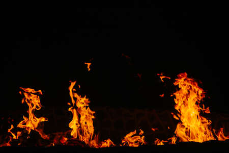 Fire flames isolated on black background. Copy space.の写真素材