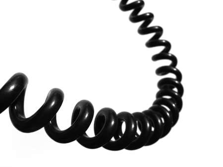 Phone cable curved on a white backgroundの写真素材