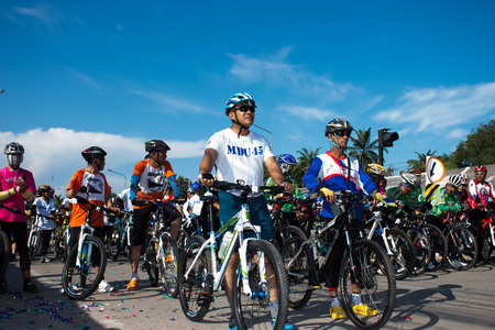 Satun, Thailand - August 18, 2014: A group of mountain bikers are waiting to release the start joint campaign tour for nature conservation on 18 August 2014.のeditorial素材
