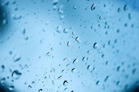 blurred water drops on mirror background