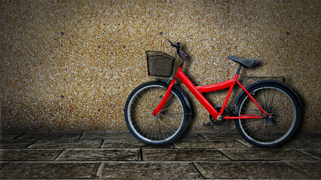red bicycle on old dirty  house wall.の写真素材
