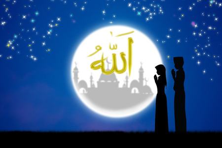 man praying to allah god of Islam .The words spell is Allah means the God of Islam