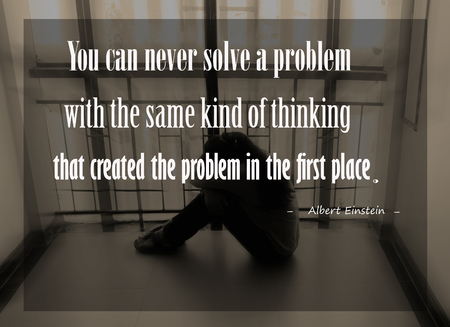 Inspirational quote  by Albert Einstein on sunset  blurred background