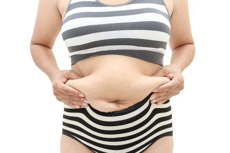 Woman's body has fat and cellulite.の写真素材