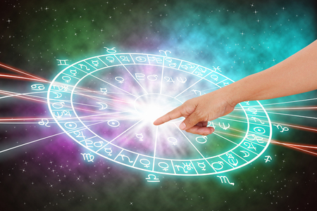 Hand and background of the horoscope concept.の写真素材