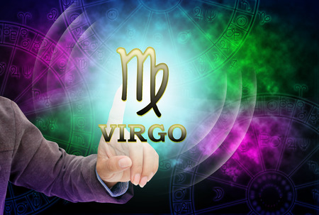 Astrologer woman's touch to technology background of the horoscope ,with 12 zodiac.の写真素材