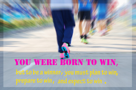 Inspirational quote on blurred sport background.の写真素材