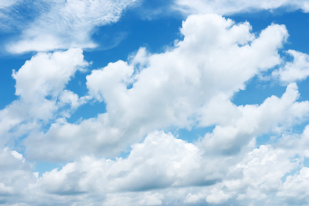 White clouds in the blue sky.
