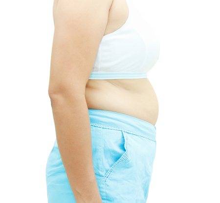 abdominal surface of fat woman on white background,with clipping path.の写真素材