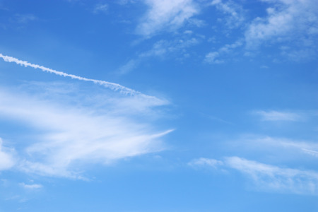  White clouds in the blue sky.