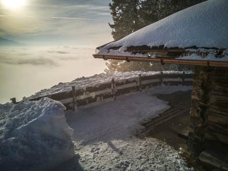 Mountain vacation log houses at ski resort . Winter wonderland.の写真素材