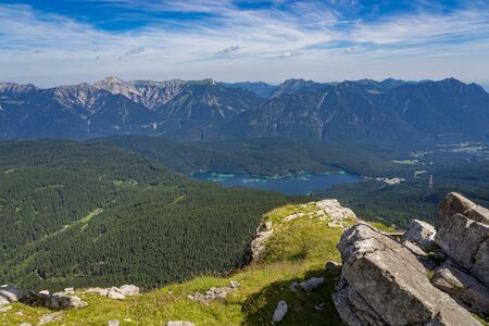 Aerial view on Eibsee lake in front the Alps