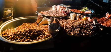 Oachira,Kerala / India - November 28, 2019: Peanuts for sale in night. Several Masala peanuts from street.のeditorial素材