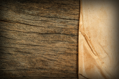 Old paper on the wood backgroundの写真素材