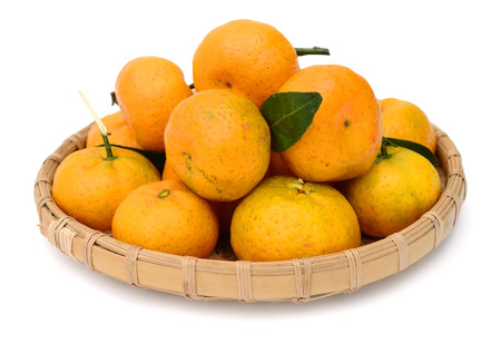 closeup of a pile of halved tangerines ..の写真素材