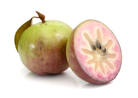 Star Apple or Chi Breast milk cainito fruit isolated on white backgroundの写真素材