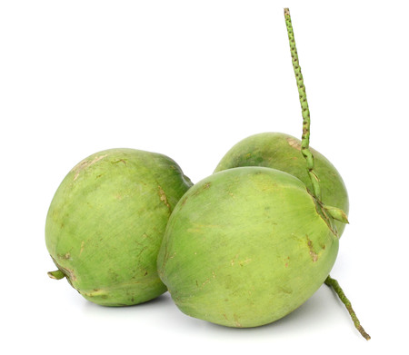 Green coconut fruit isolated on white background.の写真素材