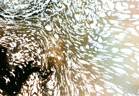 Blue and gold liquid texture. Hand drawn marbling background. Ink marble abstract pattern