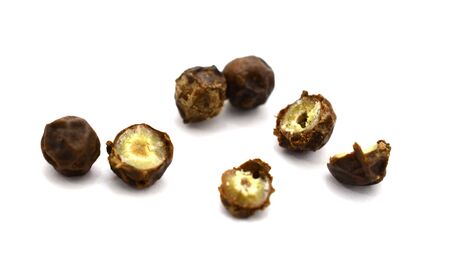 Black pepper was placed on a white background and isolatedの写真素材