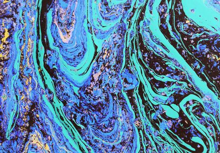 Blue and golden liquid texture, watercolor hand drawn marbling illustration, abstract backgroundの写真素材