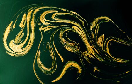 Marbled blue and golden abstract background. Liquid marble pattern.の写真素材