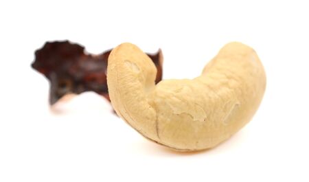 cashew nuts heap on white backgroundの写真素材