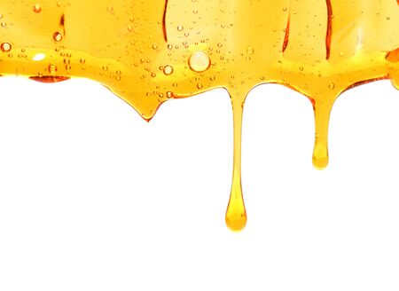 Gold shiny droplet fallingの写真素材