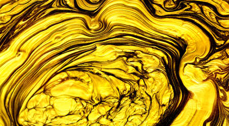 Golden paint strokes as background.の写真素材