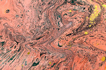 Marbled blue, green and golden abstract background. Liquid marble pattern. Stain, creative.