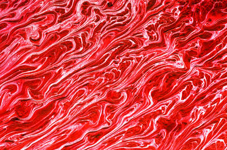 ed and gold marbling pattern. Golden marble liquid texture. Black, blot.の写真素材