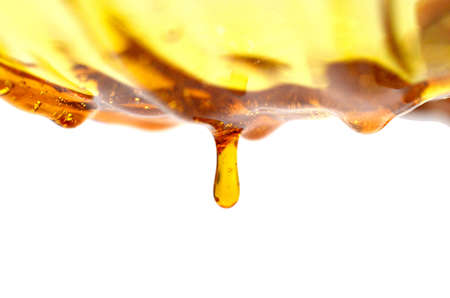 Maple syrup on white backgroundの写真素材