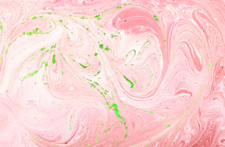 Abstract multi-colored paint background. Acrylic texture with marble pattern. Wallpaper. Mixing paints. Modern art.の写真素材