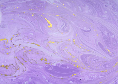 Abstract artwork marble liquid texture. Purple and gold background.の写真素材