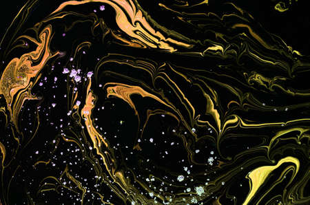 Diffuse liquid gold on black. Golden wave and bubbles. Abstract liquid marble background or texture....